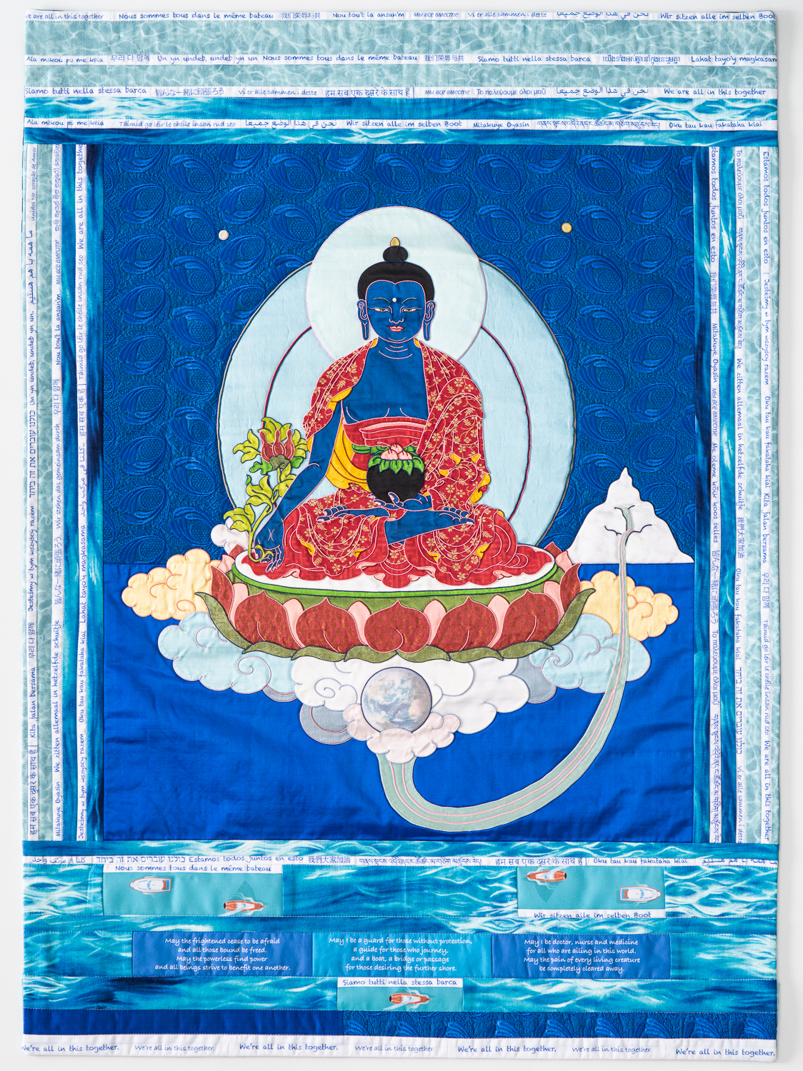 All in This Together, Medicine Buddha thangka quilt by Leslie Rinchen-Wongmo
